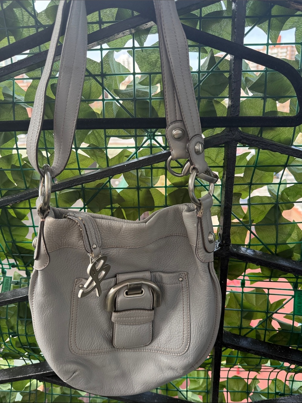 Gray Leather Shoulder Bag with Front Buckle Accent. Crossbody/Shoulder bag